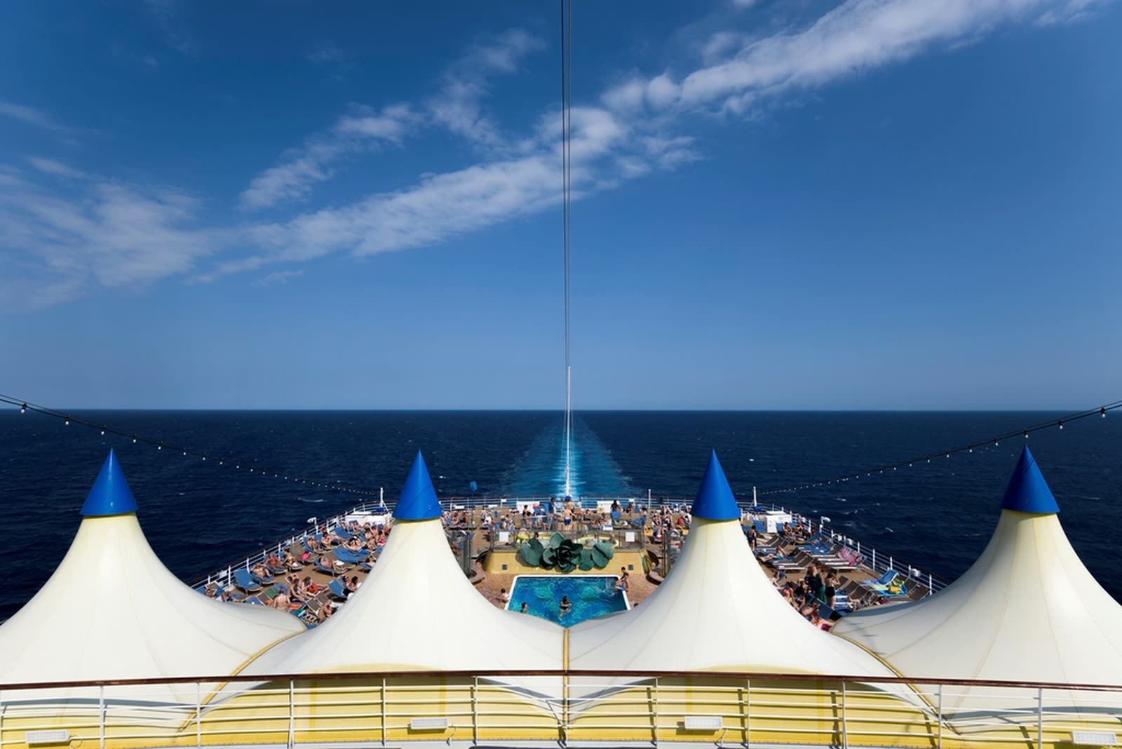 The deck of a cruise ship with the pool
